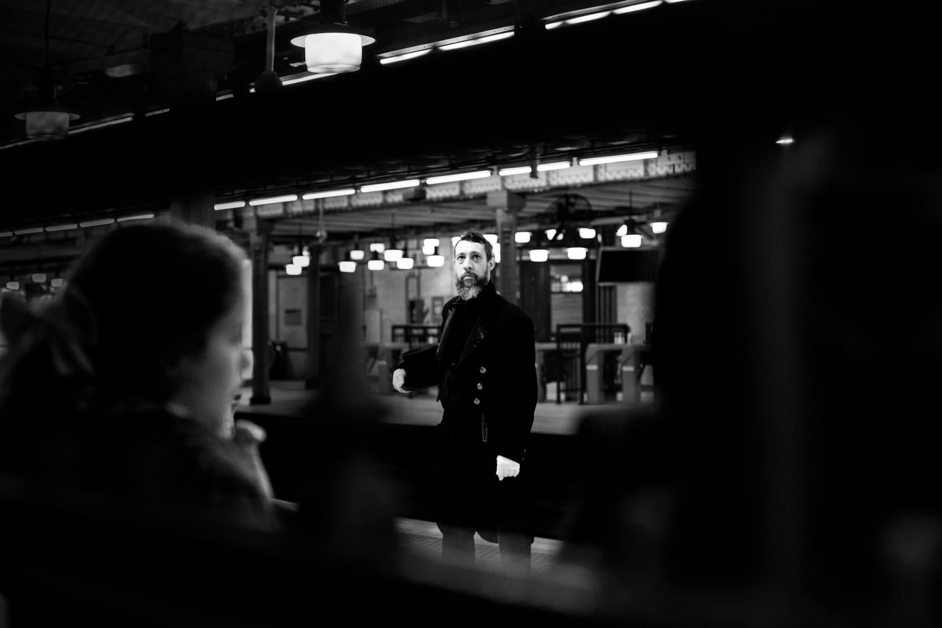 candid black and white subway scene in buenos aires