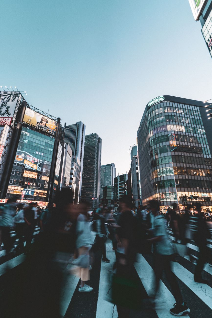 bustling urban crossing in tokyo at twilight